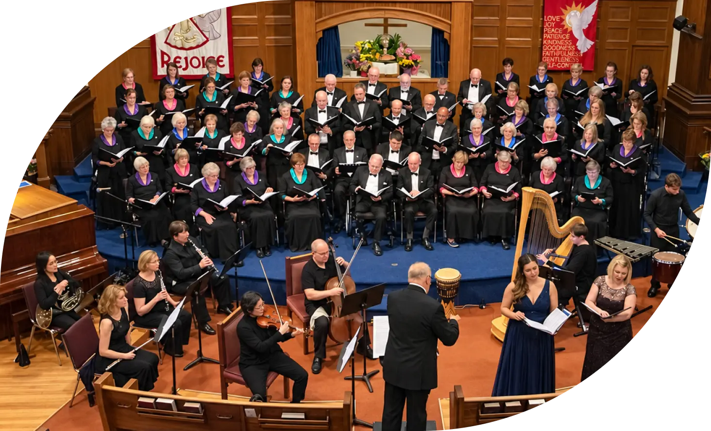 Kings Chorale performing with musicians in a church